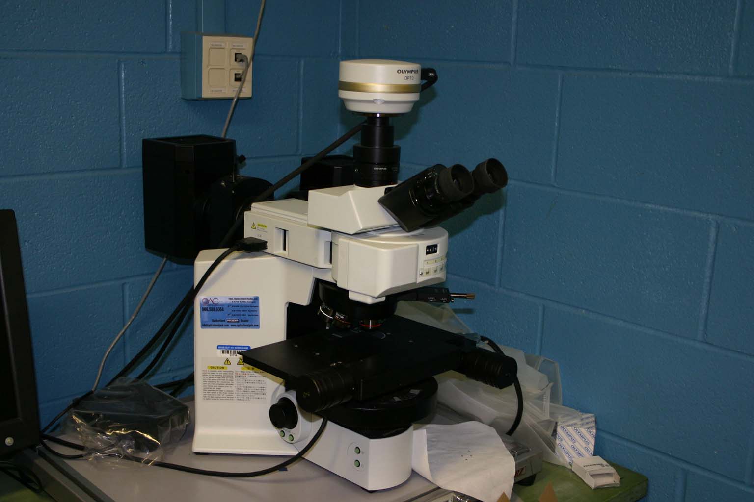 Olympus BX-61 optical microscope with computer controlled stage, autofocus, brightfield, darkfield, Nomarski, etc.