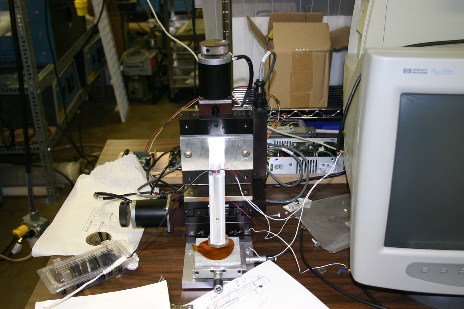 Computer controlled resistivity system for automated 4-point probe measurements of thin film libraries (RT-250°C)